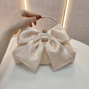 NEW: Elegant Cream Bow Handbag in dust bag
